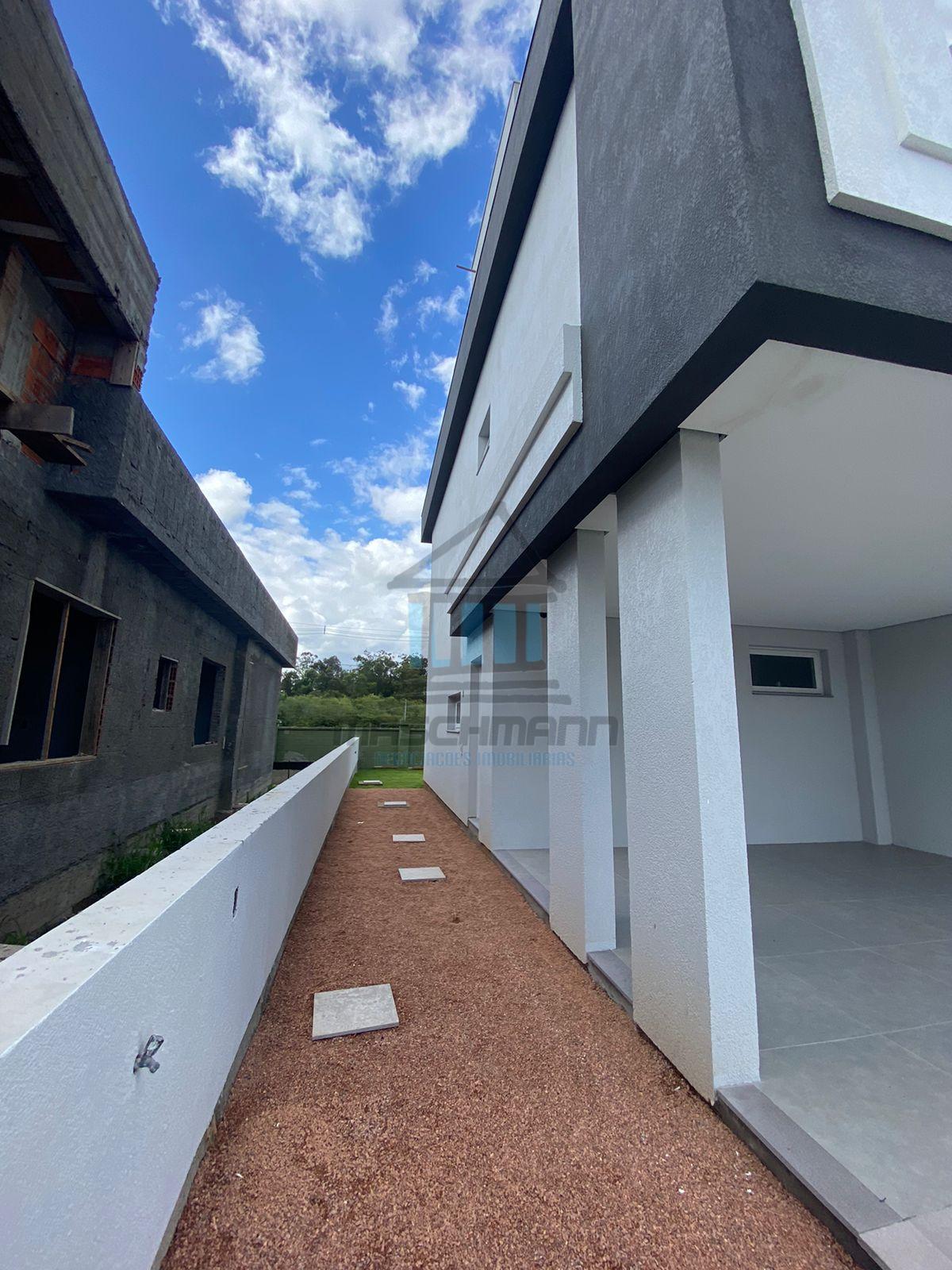 Linda Casa no Condomínio Terras Alpha Gravataí à Venda, 3 Quartos, 1 suíte,  2 carros cobertos.